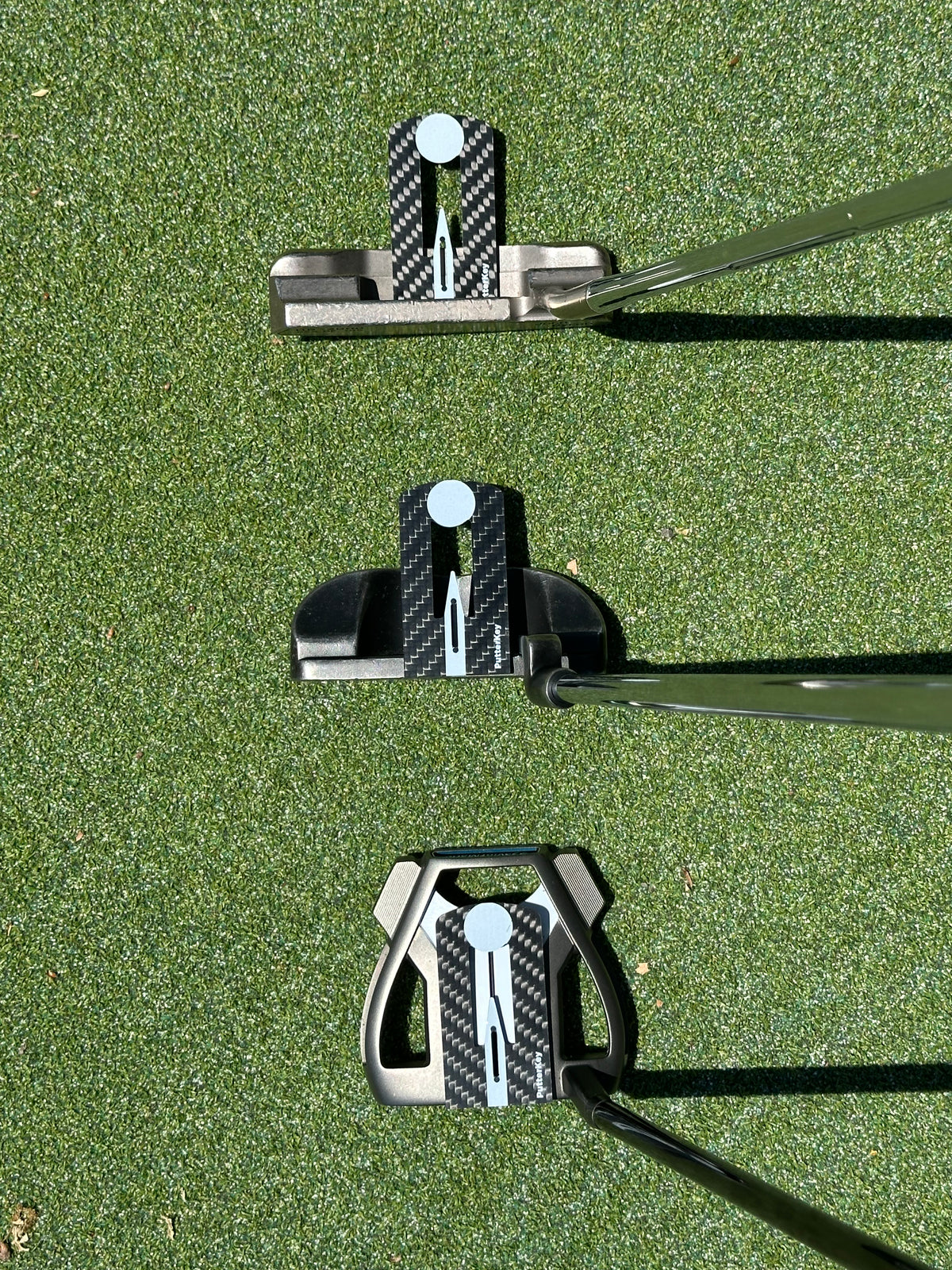Putter Key on a variety of putters