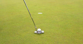 Putter Key shown on a blade putter from behind the golfer