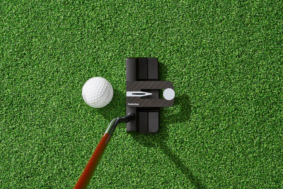 Golfer using Putter Key's Shape-Lock Method alignment system